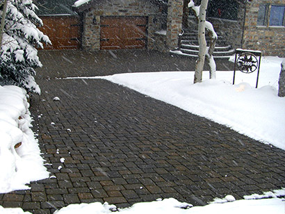 Heated driveway with brick pavers.